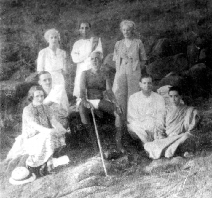 Devotees sitting on the Hill with Bhagavan