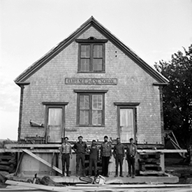 Schoolhouse atop its new, raised foundation
